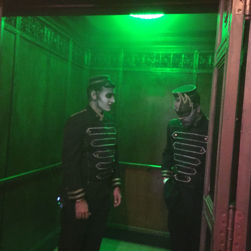 Undead bellhops prepare an elevator to Hell...or to the Odditorium